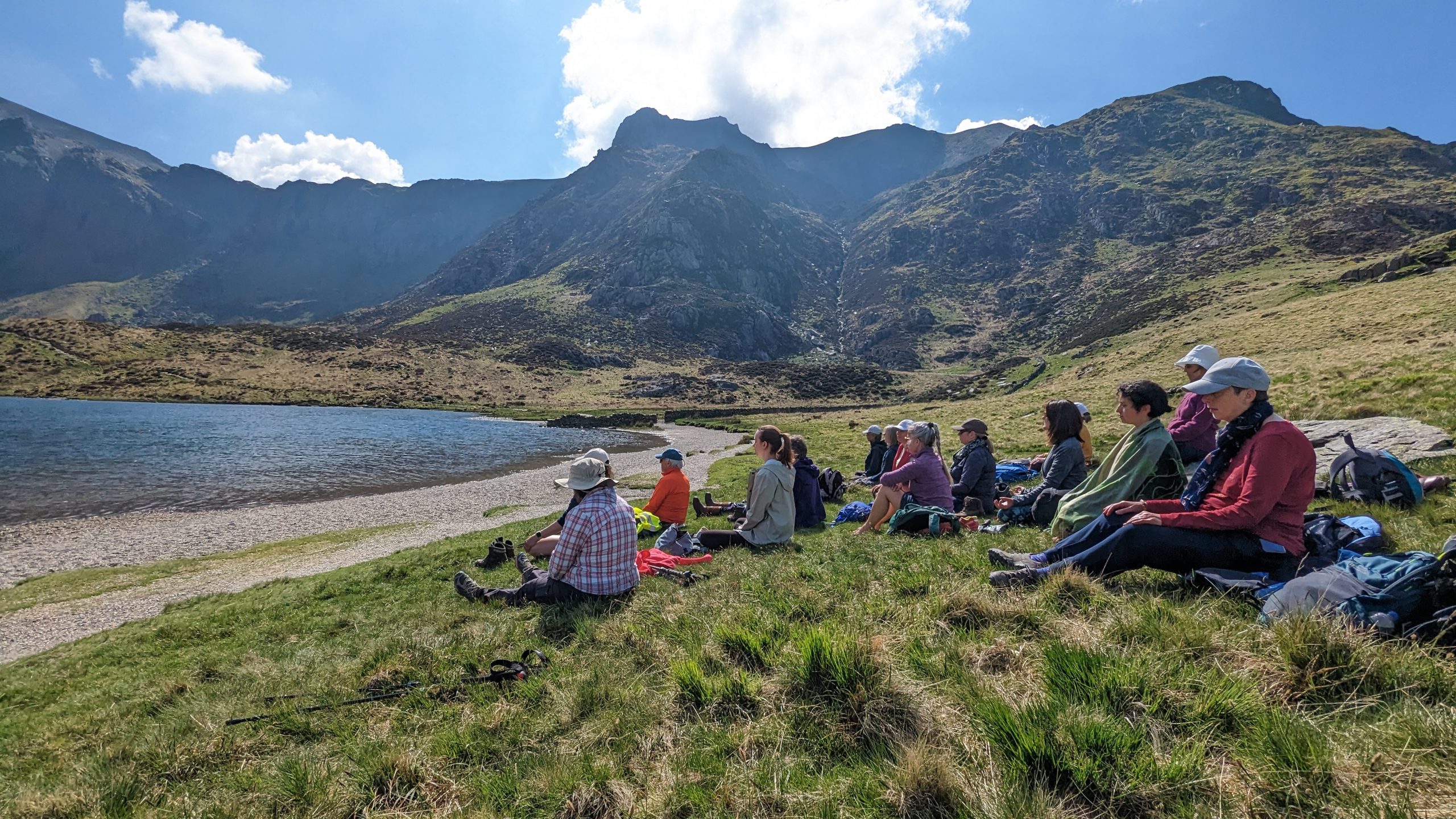 meditating by lake snowdonia dru yoga